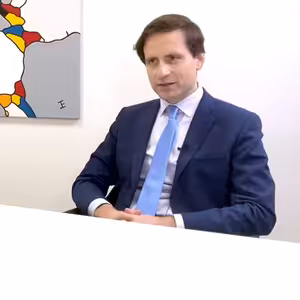 Hypotéky k pěti procentům, inflace k osmi, varuje člen Národní ekonomické rady vlády