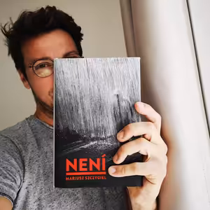 Není